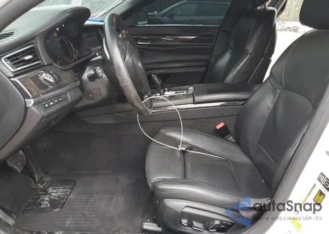 2015 BMW 750 I z USA, uszkodzony, nr VIN WBAYA8C52FD825641